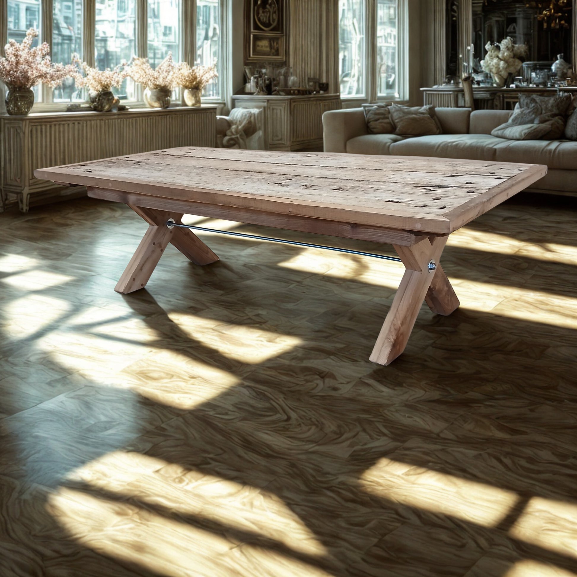 Handcrafted solid French Oak coffee table using reclaimed wood and recycled materials, set in a neutral themed London style living room with parquet floor, large window space and wooden furniture.