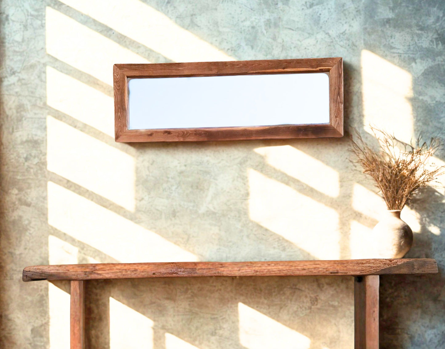 Rustic living room staging, featuring our wide solid oak mirror created from reclaimed wood and our rustic solid oak console table created from an old carpenter's workbench. 