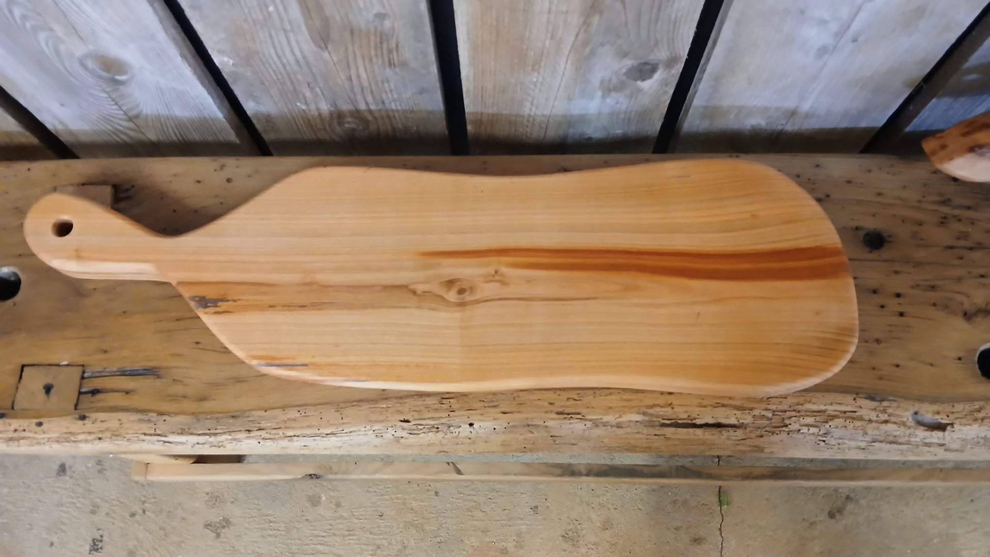 Full-length view of French cherry wood charcuterie board, handmade in France.