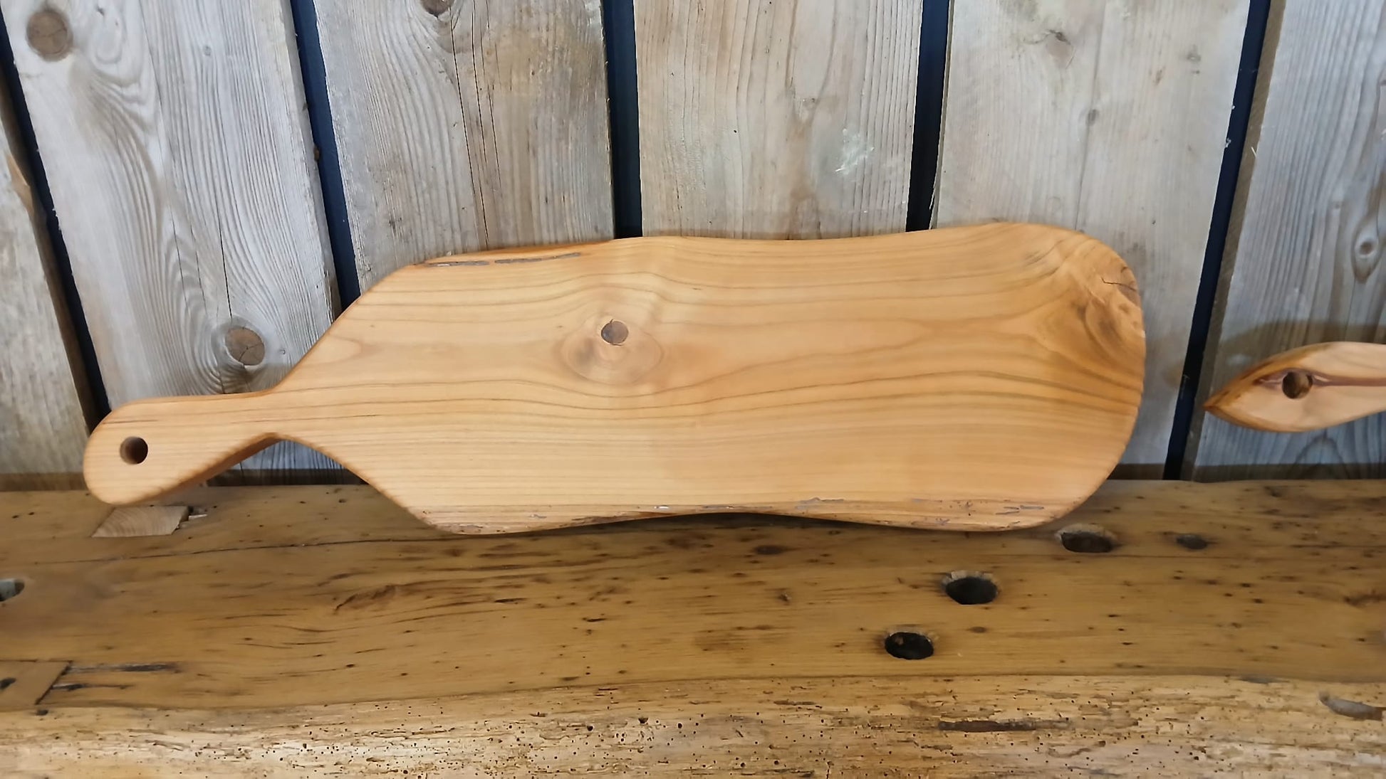 Back view of French cherry wood charcuterie board, solid wood, handmade in France.