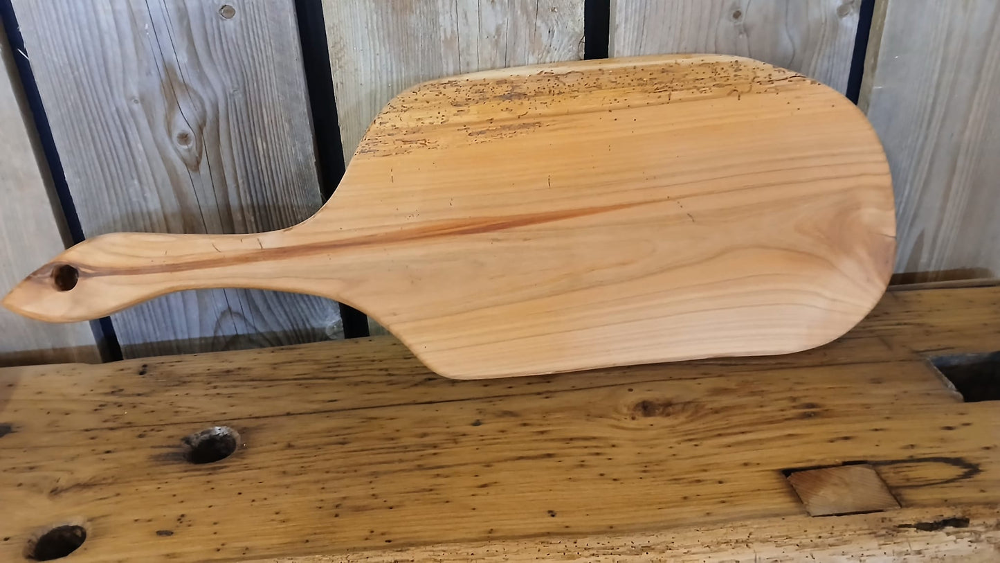Second style of French cherry wood serving board, highlighting natural grain, handmade in France.